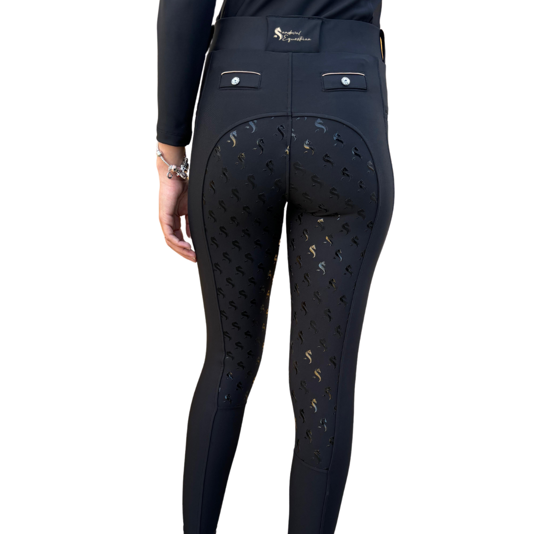 Sandoval Equestrian Black Gold equestrian leggings,pantaloon de montar
Luxury equestrian outfit Black Gold
High-quality equestrian clothing set
Elegant black and gold riding apparel
Breathable riding breeches and shirt
Stylish Black Gold equestrian wear
Best equestrian clothing set 2025
Exclusive equestrian fashion for competitions
Premium black and gold riding outfit
Sandoval Equestrian riding for adult