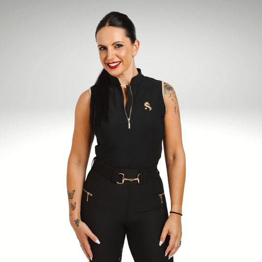 Reitshirt Damen ärmellos Black Gold
Sandoval Equestrian Top kaufen
atmungsaktives Reitshirt Damen
luxuriöses Reitoberteil Schwarz Gold
Reitmode Damen elegant

Black Gold sleeveless equestrian shirt
Sandoval Equestrian riding top women
breathable riding shirt sleeveless
luxury equestrian fashion Black Gold
premium equestrian top women

camiseta sin mangas ecuestre Black Gold
top de equitación Sandoval Equestrian
camiseta transpirable montar a caballo
moda hípica de lujo Black Gold
camiseta ecuestre mujer